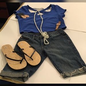 Tilt capri's with blue shirt and flip flops