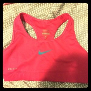 Pink and blue Nike sports bra