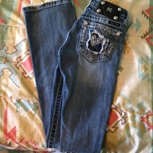 Distress pocket Miss Me boot cut jeans