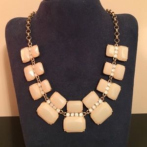 Cream-colored statement necklace with stones!
