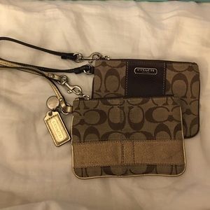two coach wristlets