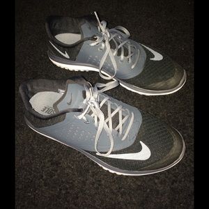 Grey/black Nikes
