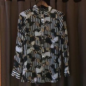 NEW Women's black & white stripped/printed blouse.