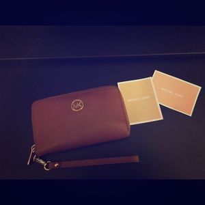 Authentic Michael Kors wallet/smartphone wristlet