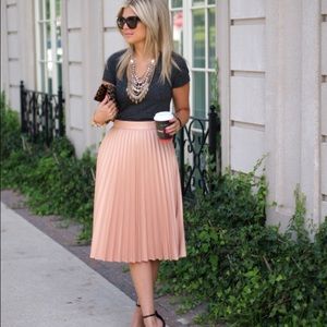 Pink pleated midi skirt