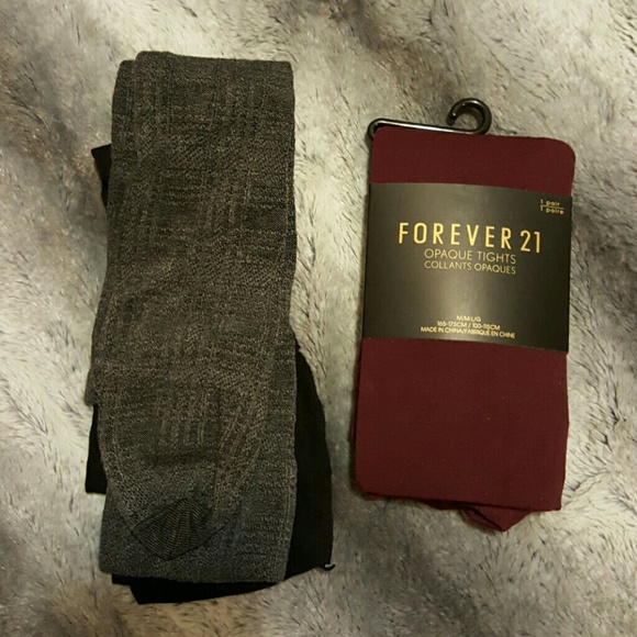 2 pairs of unworn tights, burgundy and grey