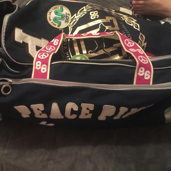Victoria's Secret luggage with wheels