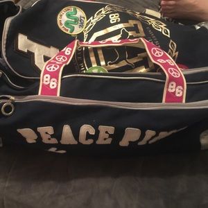 Victoria's Secret luggage with wheels