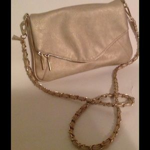 Guess gently used gold metallic handbag