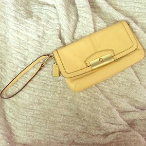 Authentic yellow leather coach clutch