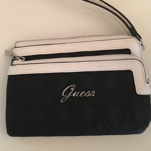 Black and white guess wristlet