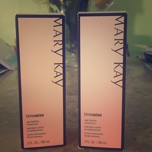 Two Mary Kay time wise moisturizers.