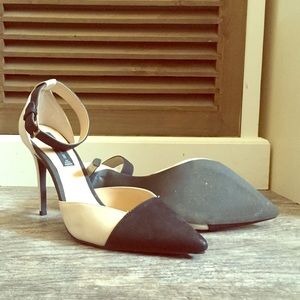 Black and cream colored heels