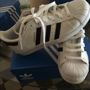 Adidas superstars size 6 and  7 in Women