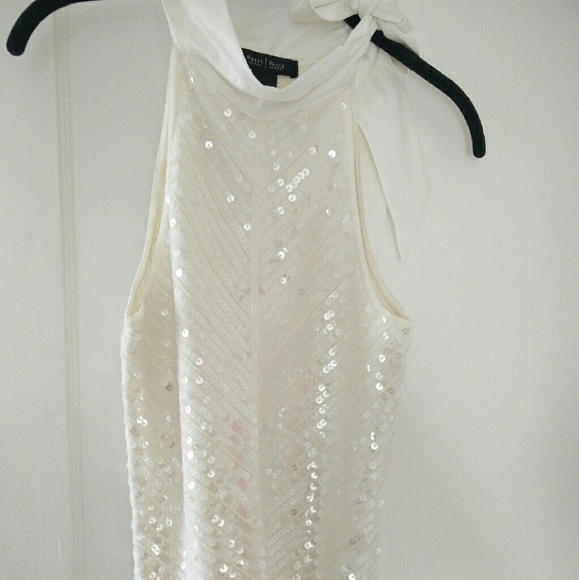 Sequence top.  Ties around neck over left shoulder