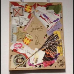 Christian Louboutin 20th anniversary shopping bag.