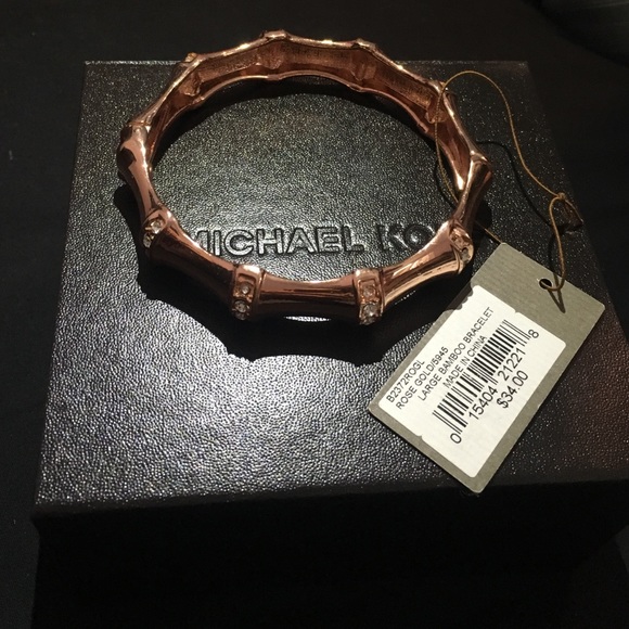 Brand new Tommy Bahama Rose Gold with "diamonds"