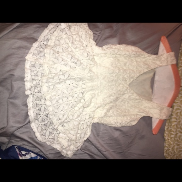 White lace flared low cut tank top