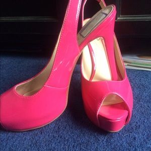 Pink open toe platform pumps