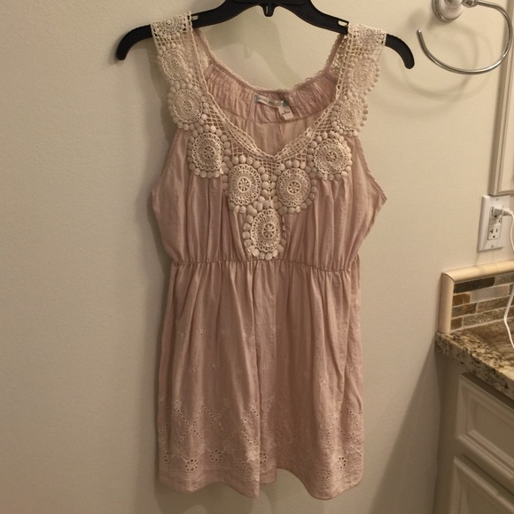 Embroidered sleeveless top - gathers at the waist