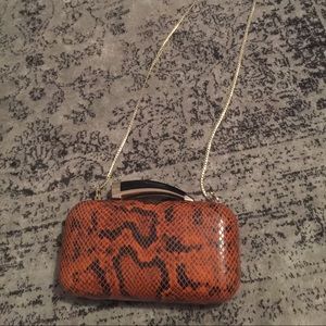 Vince Camuto Hard-Shell Horned Snakeskin Clutch