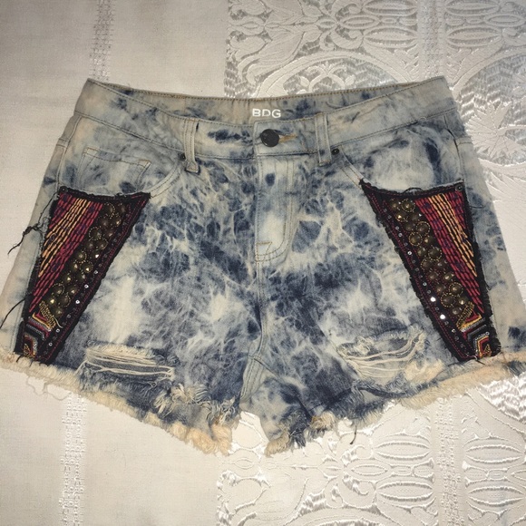 UO BDG mid rise acid wash embellished shorts