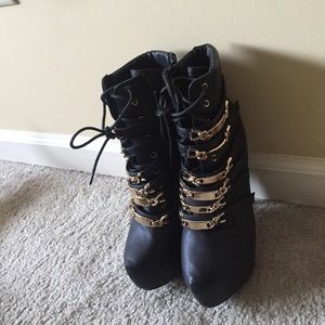 Black and gold booties