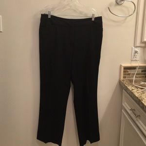 Black pants with pockets in front and zipper