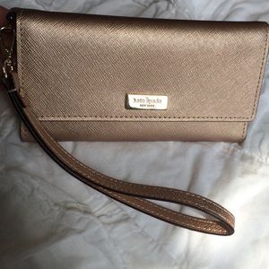 Brand new with tags Kate Spade rose gold wristlet