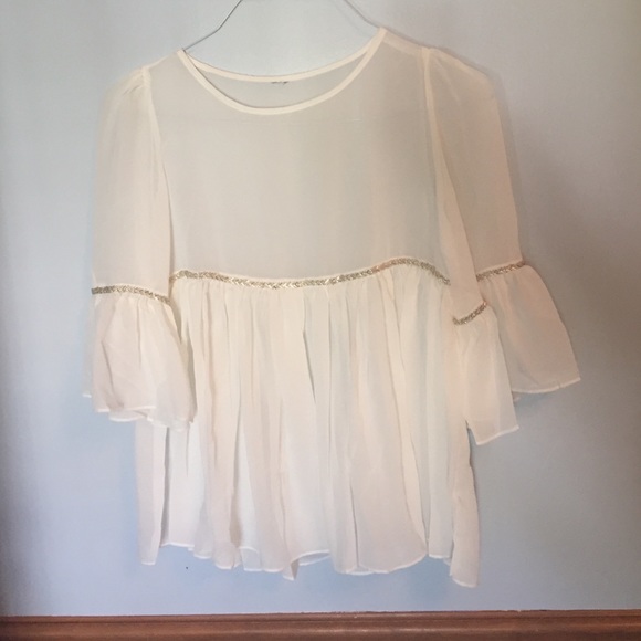 Flowy top with beaded waits and elbow line