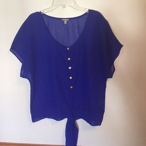 Loose, see through button down that ties at bottom