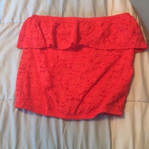 Strapless pink crop top with floral pattern