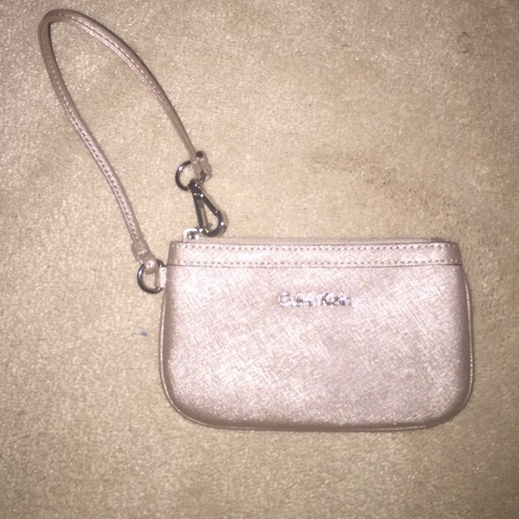Tan Calvin Klein wristlet