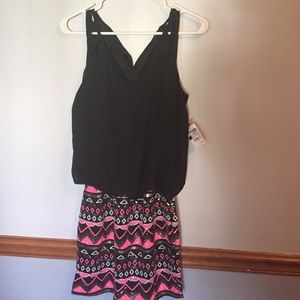 Trendy dress with black top and sequence on bottom