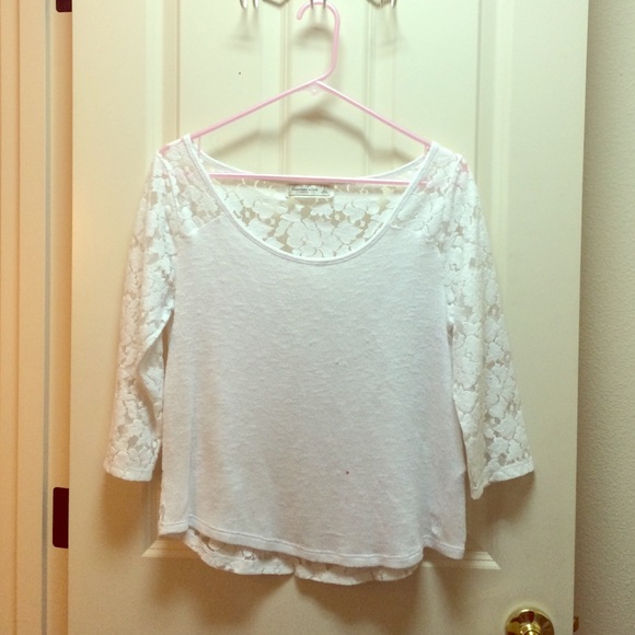 White knit top with pretty lace detail.
