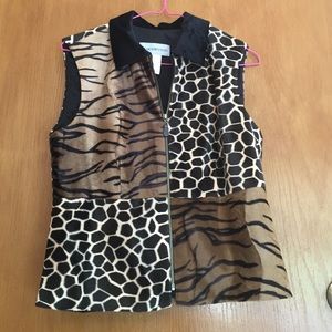 This animal print vest is in excellent condition!
