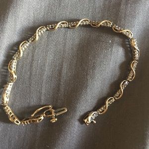 Real Gold with tiny diamonds bracelet.