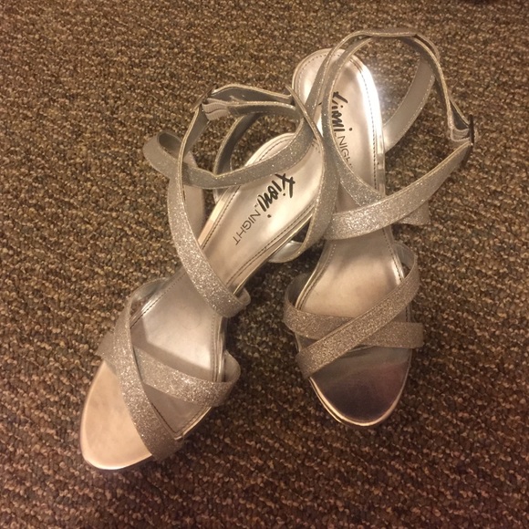 Silver high heels size 8