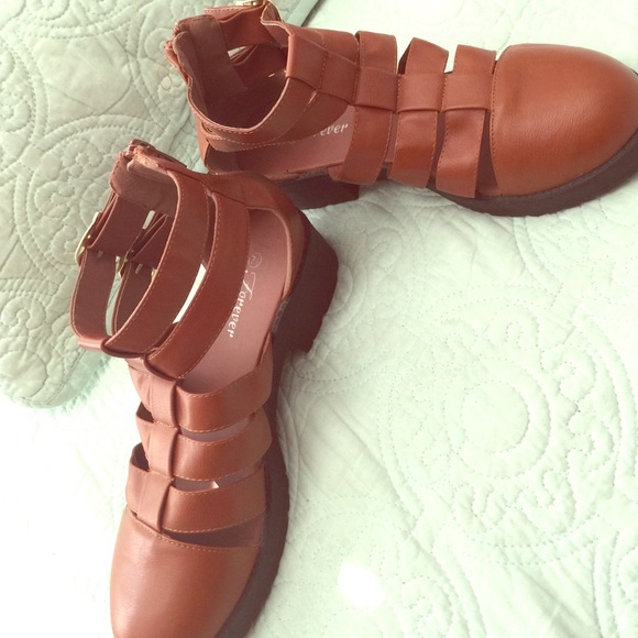 Brown strappy sandals with zippers