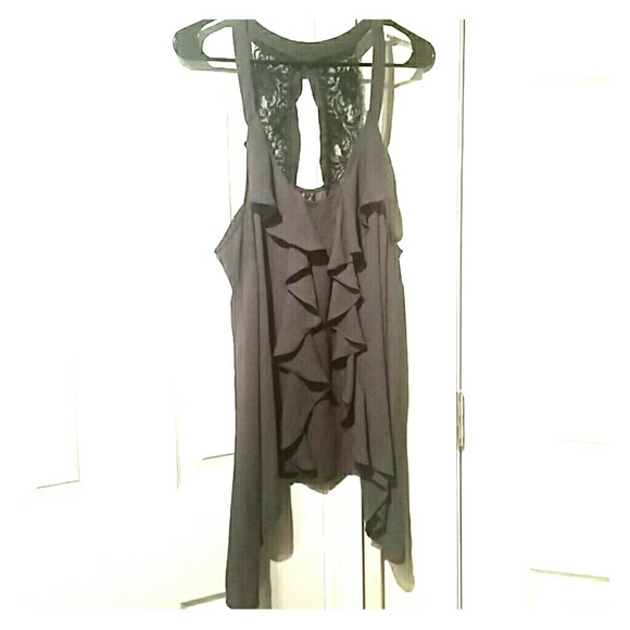 Asymmetrical tank-top.
