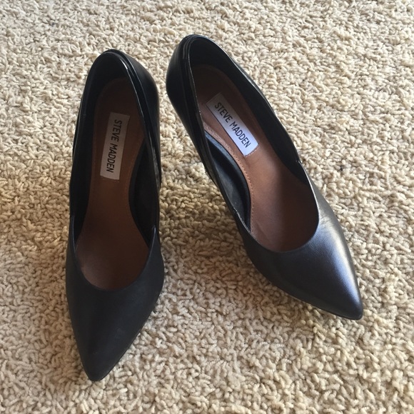 Black leather pointed heels.