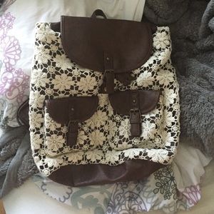 Girly lace and leather backpack