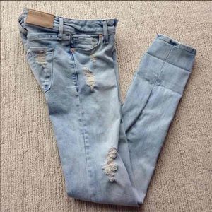 Distressed skinny denim jeans
