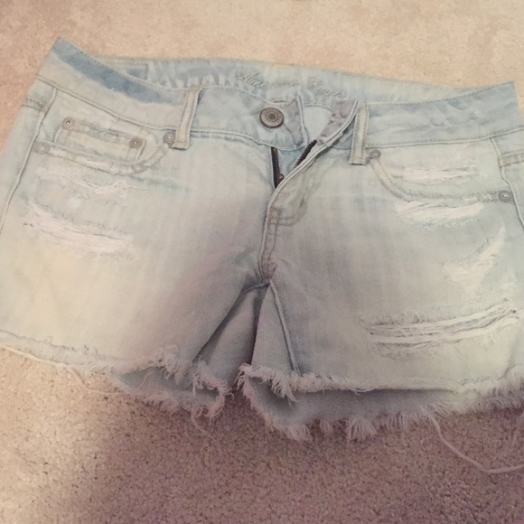 Distressed denim shorts