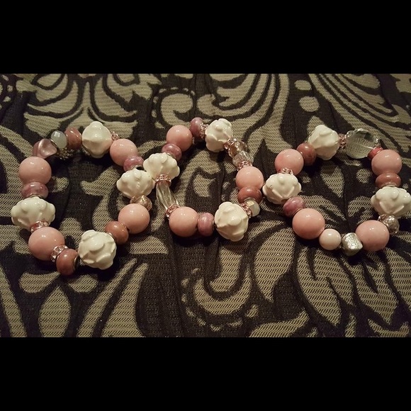 Pink and white bracelets