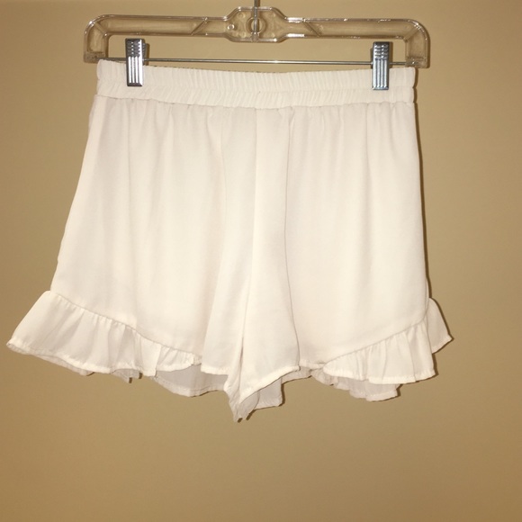 cream shorts with side ruffle