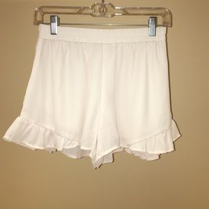 cream shorts with side ruffle