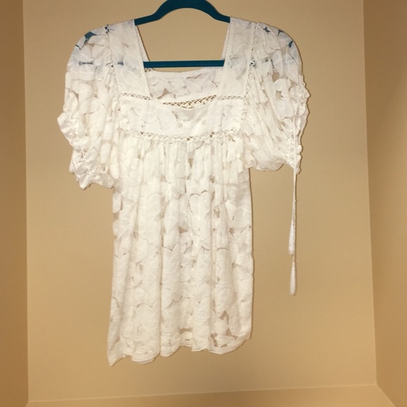 white leave patterned shirt