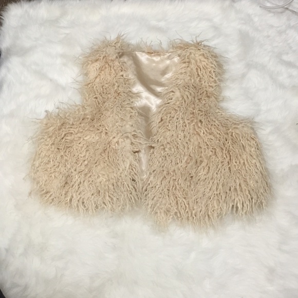 Cream faux fur vest. From Macy's