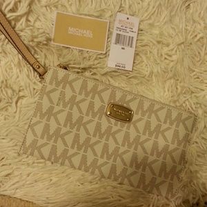 Brand new Michael kors wristlet